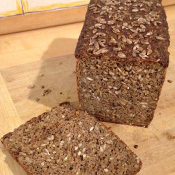 The Alchemist Hearty Seeded Rye first slice